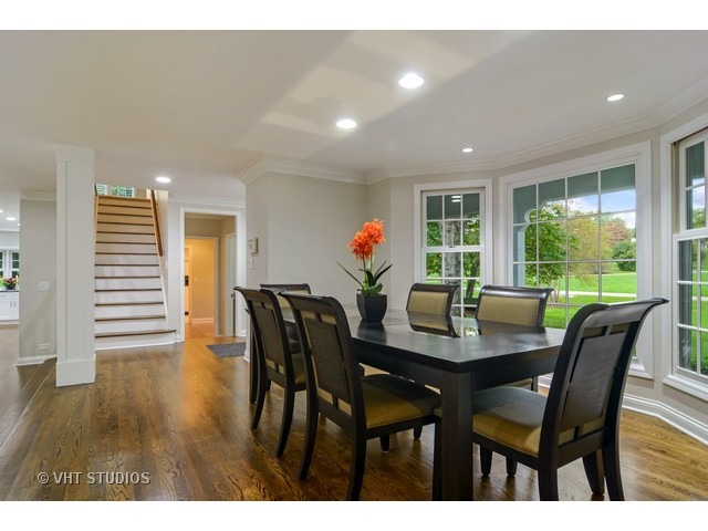 820 North Inverway Road Inverness, IL 60067 - Photo 4 of 25 a view of a dining room with furniture and wooden floor