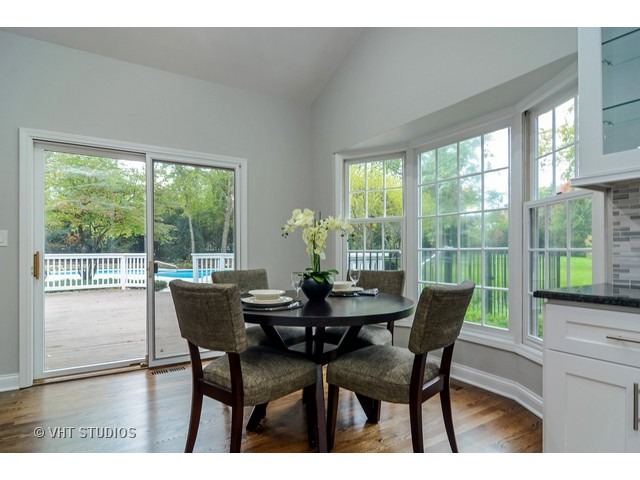 820 North Inverway Road Inverness, IL 60067 - Photo 6 of 25 a view of a dining room with furniture and wooden floor