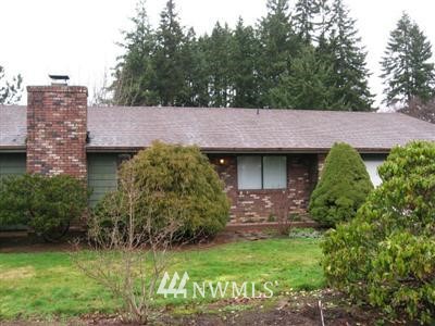 143 Galaxie Road Chehalis, WA 98532 - Photo 1 of 1 a aerial view of a house with a yard and a garage