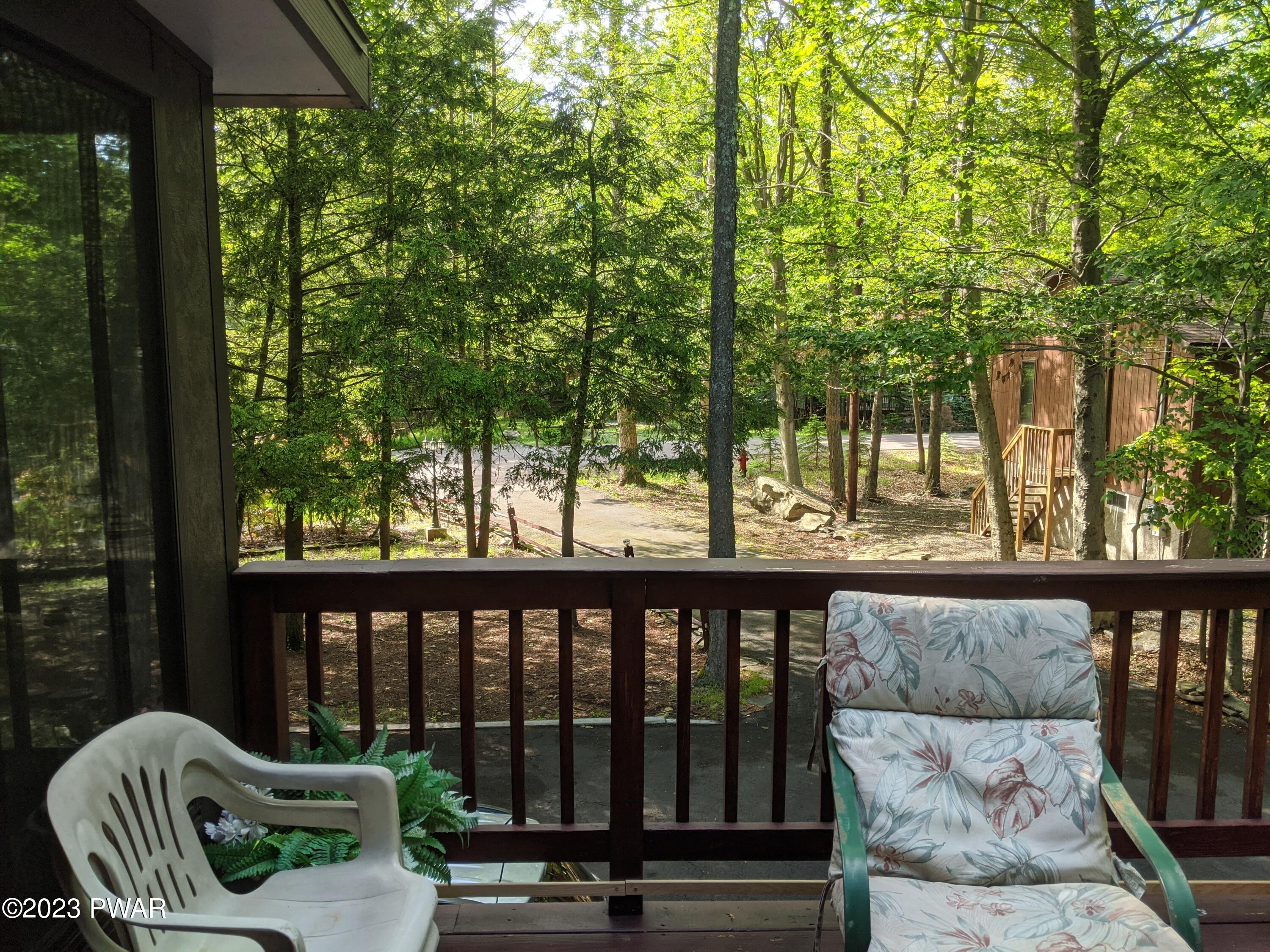 365 Northgate Road Lake Ariel, PA 18436 - Photo 6 of 68 a view of a two chairs and table in the balcony