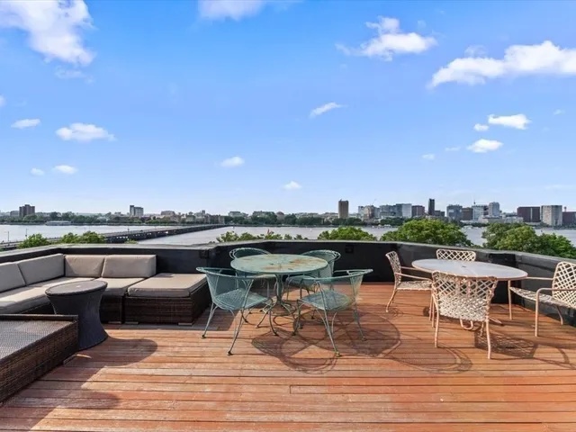 a view of a terrace with seating area