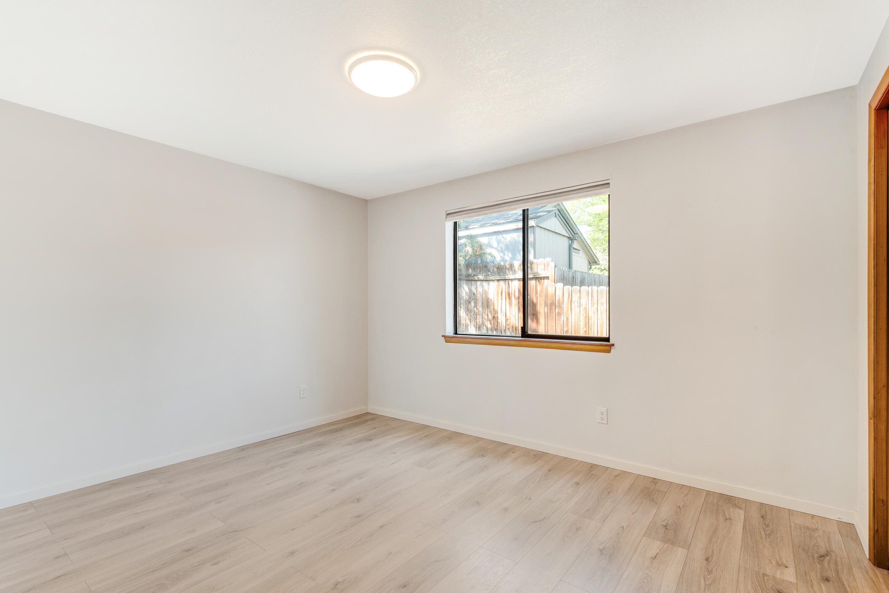 1916 Northeast Wichita Way Bend, OR 97701 - Photo 13 of 38 an empty room with a window