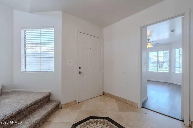 a view of livingroom with hardwood floor and workspace