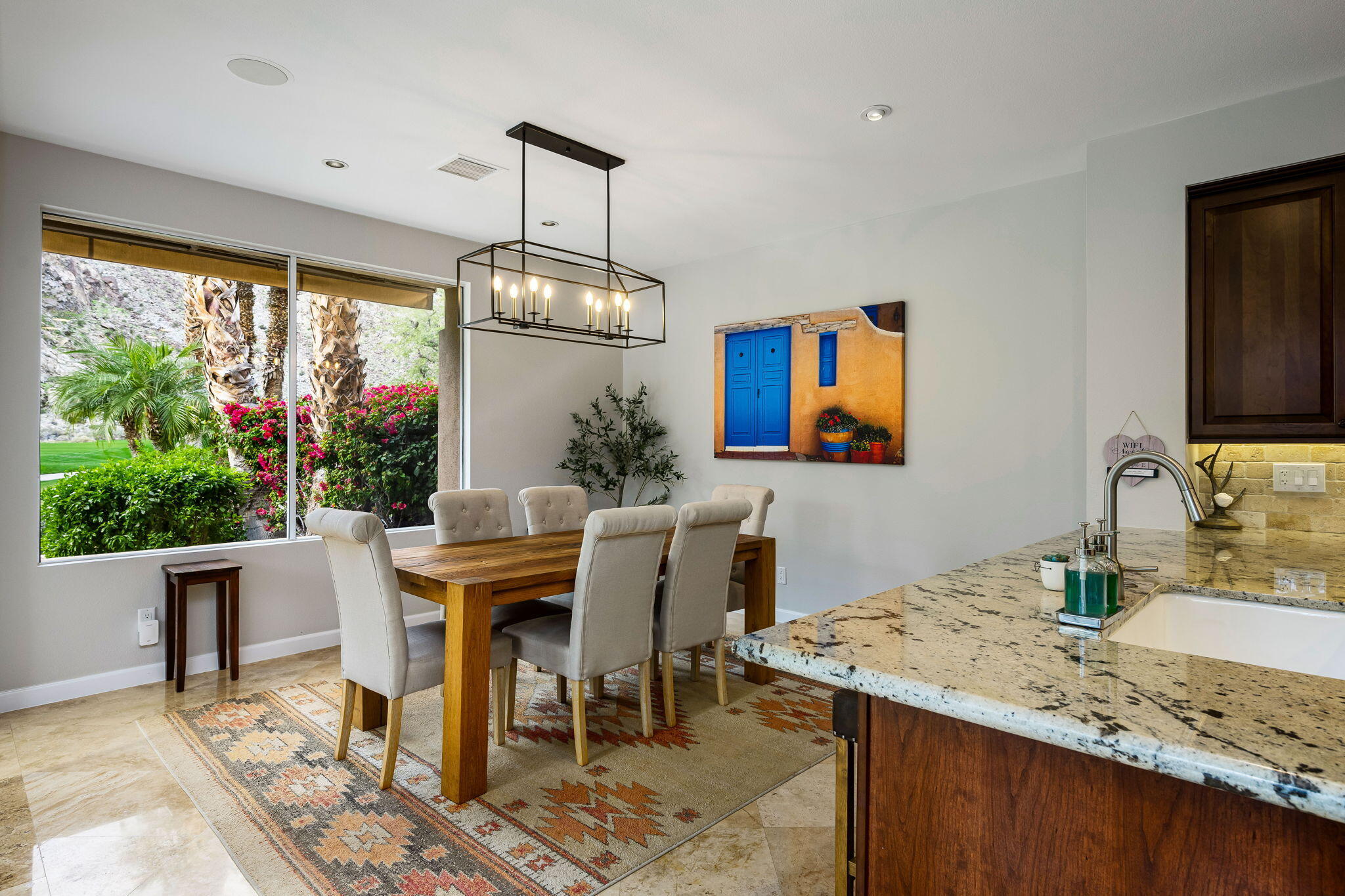 55685 Riviera La Quinta, CA 92253 - Photo 18 of 75 a view of a dining room with furniture window and outside view