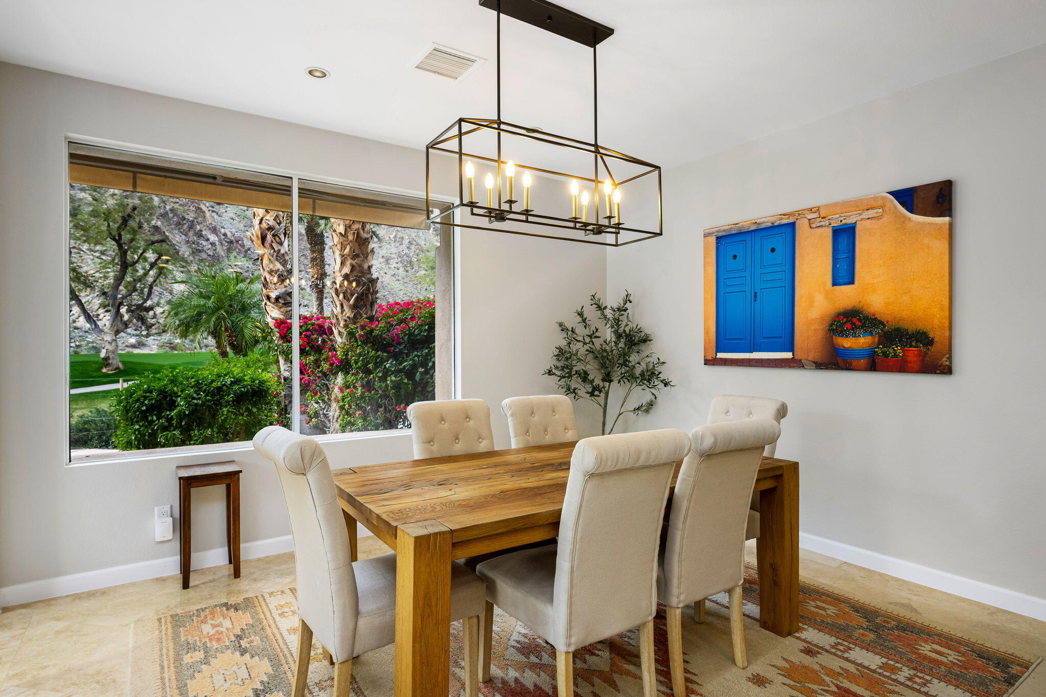 55685 Riviera La Quinta, CA 92253 - Photo 19 of 75 a view of a dining room with furniture window and outside view