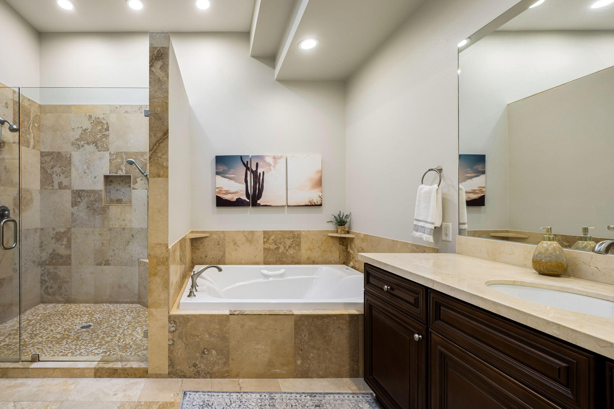 55685 Riviera La Quinta, CA 92253 - Photo 33 of 75 a bathroom with a tub sink and mirror