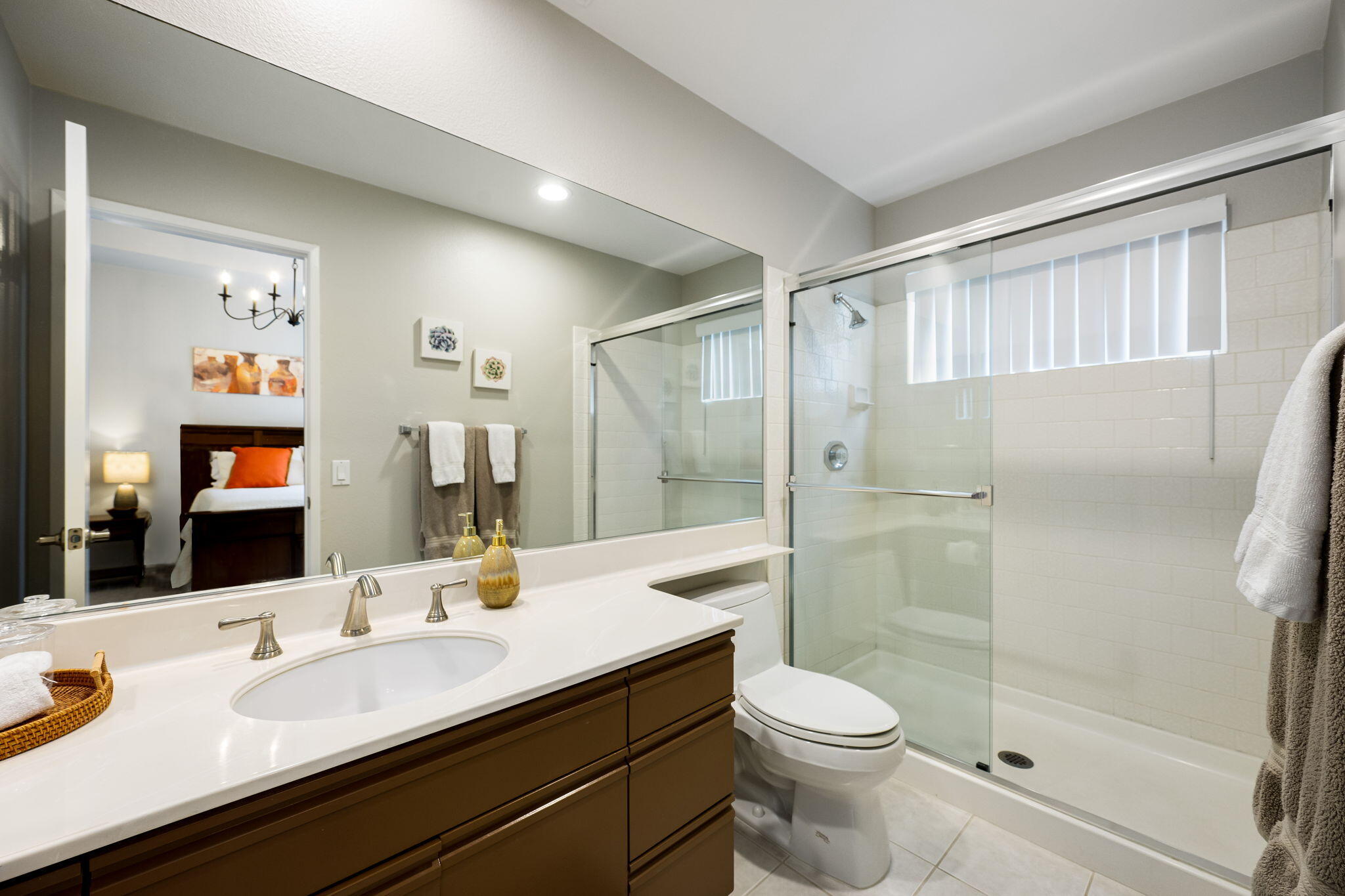 55685 Riviera La Quinta, CA 92253 - Photo 36 of 75 a bathroom with a sink a toilet and shower