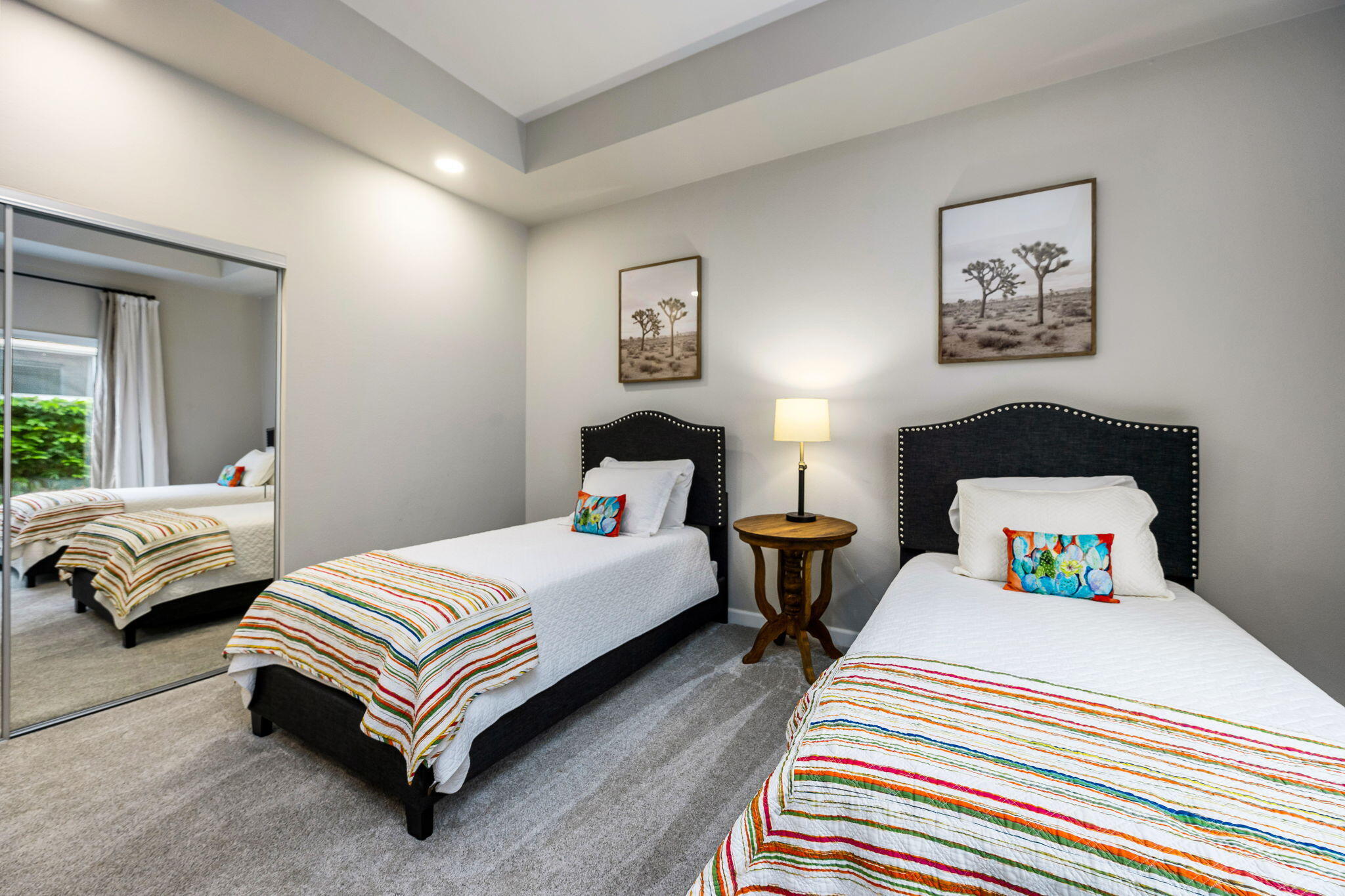 55685 Riviera La Quinta, CA 92253 - Photo 37 of 75 a bedroom with a bed a couch and a window