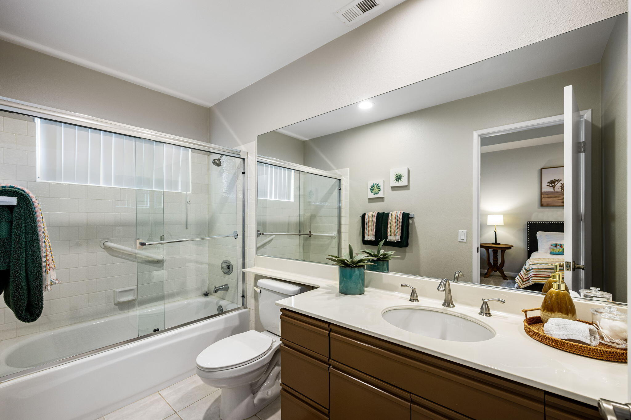 55685 Riviera La Quinta, CA 92253 - Photo 38 of 75 a bathroom with a granite countertop sink toilet and shower