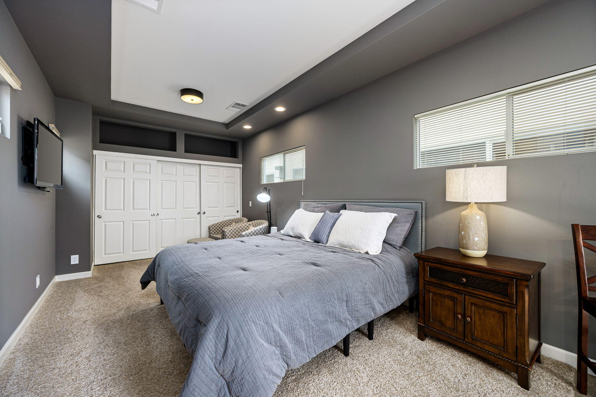 55685 Riviera La Quinta, CA 92253 - Photo 40 of 75 a bed room with a bed and a night stand