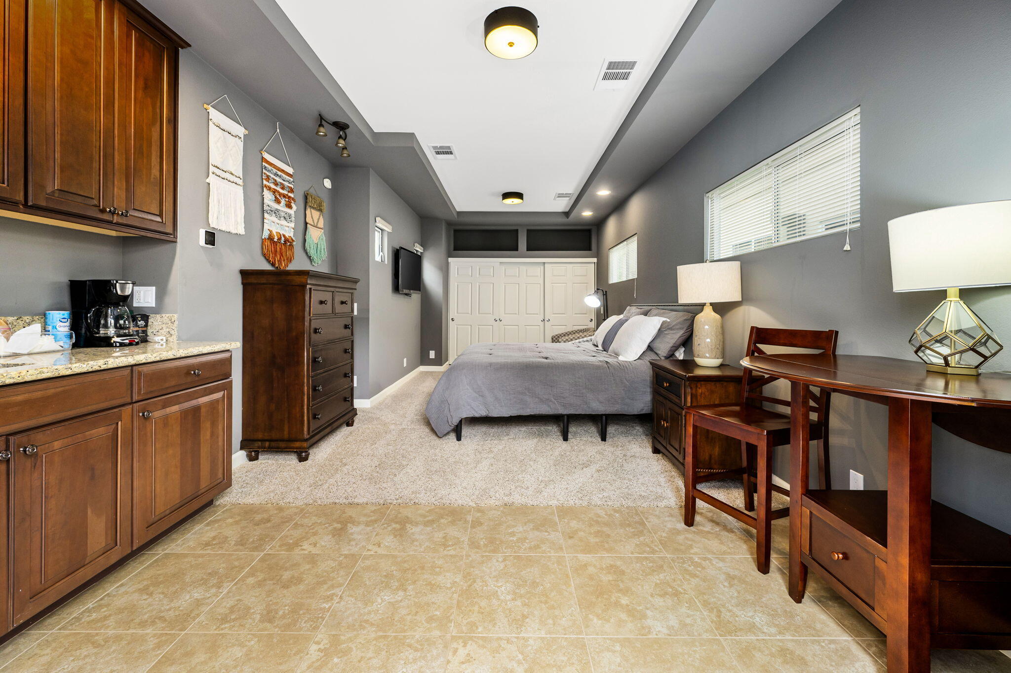 55685 Riviera La Quinta, CA 92253 - Photo 41 of 75 a living room with furniture and a flat screen tv