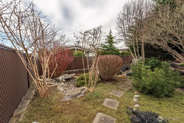 a backyard of a house with lots of green space