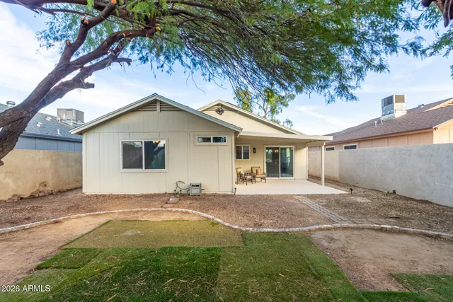 a backyard of a house with lots of green space