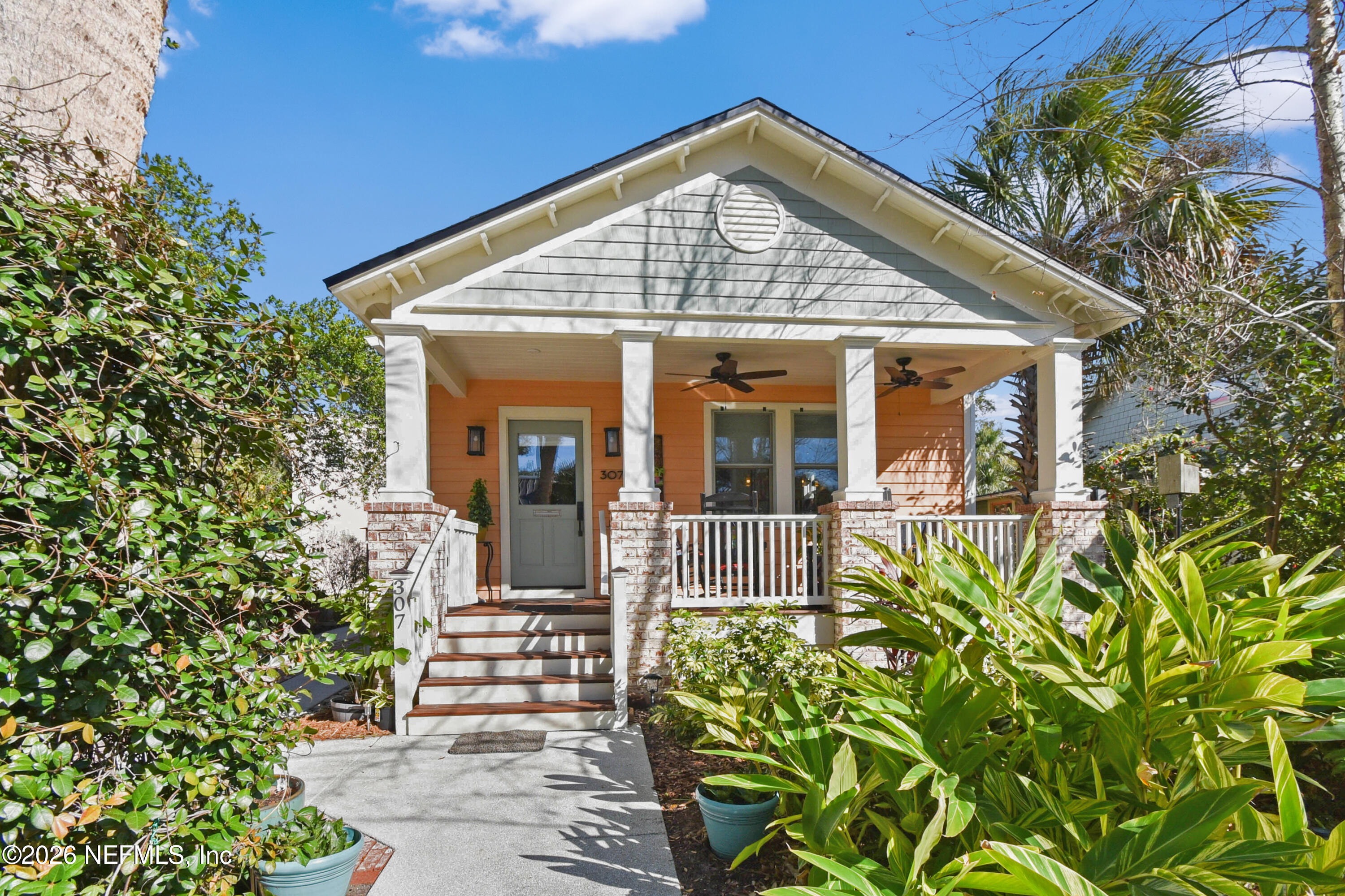 a front view of a house with a porch