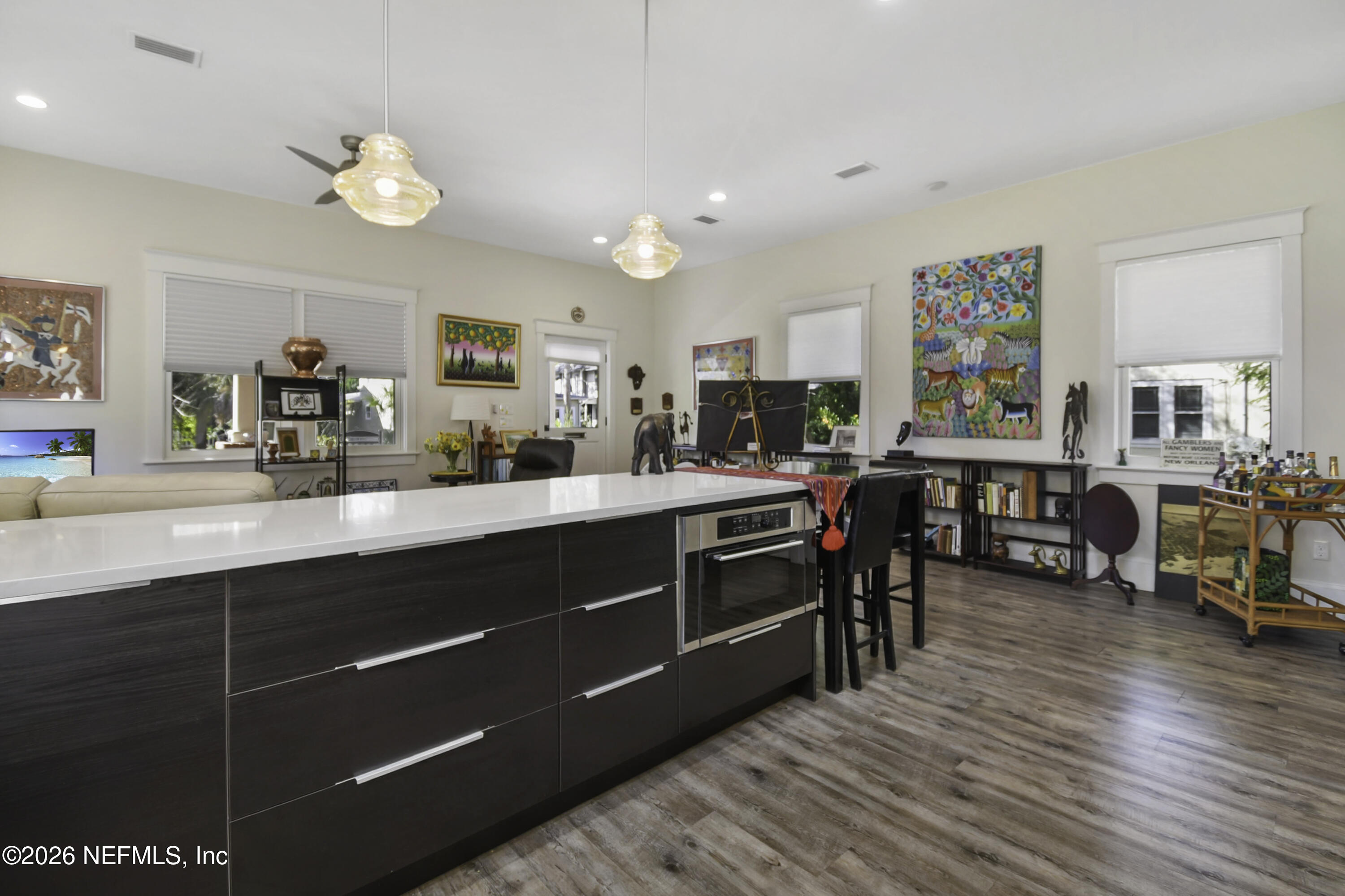 307 St George Street St. Augustine, FL 32084 - Photo 14 of 44 a room with lots of wooden furniture and a large mirror on a dresser