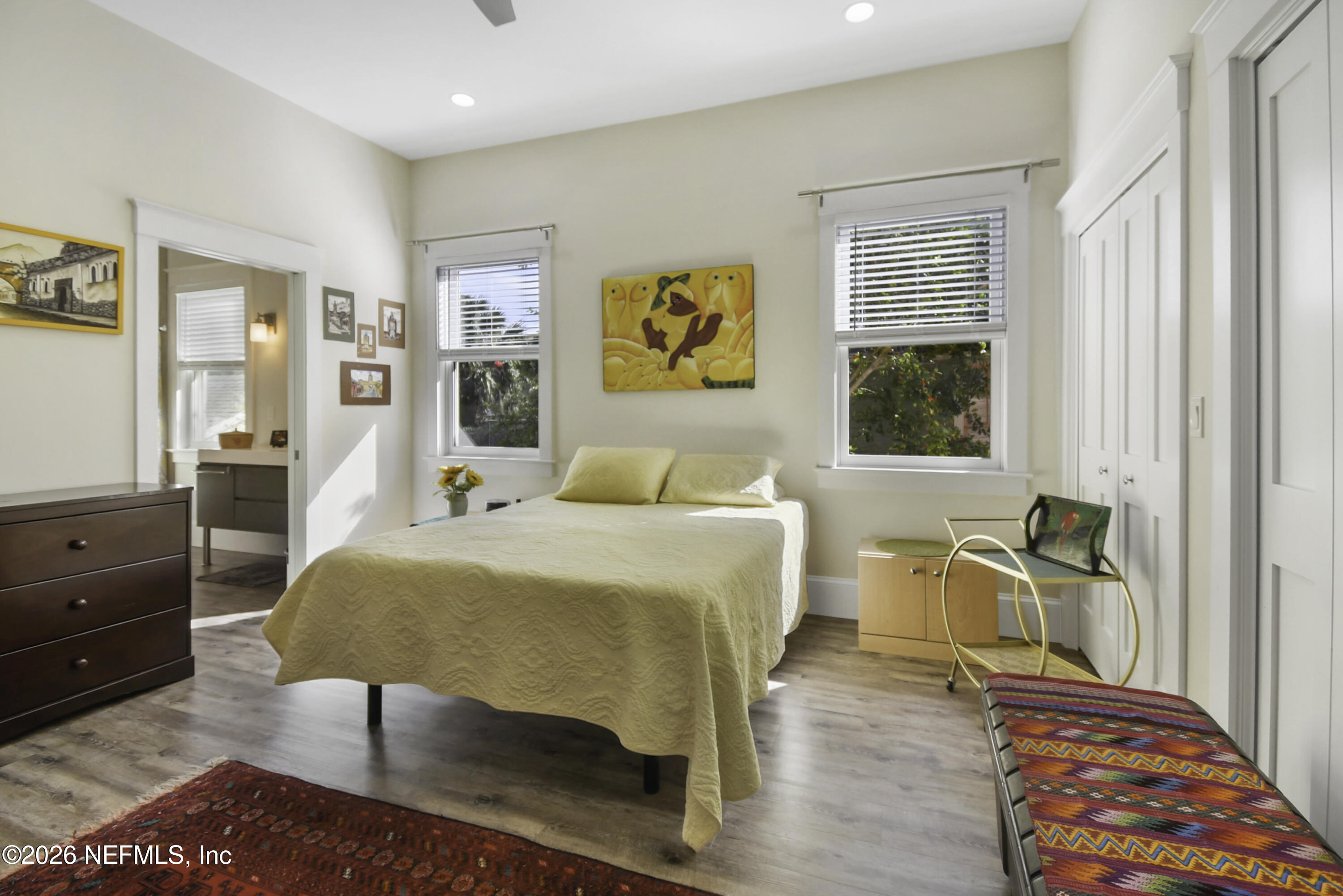 307 St George Street St. Augustine, FL 32084 - Photo 19 of 44 a bedroom with a bed and wooden floor