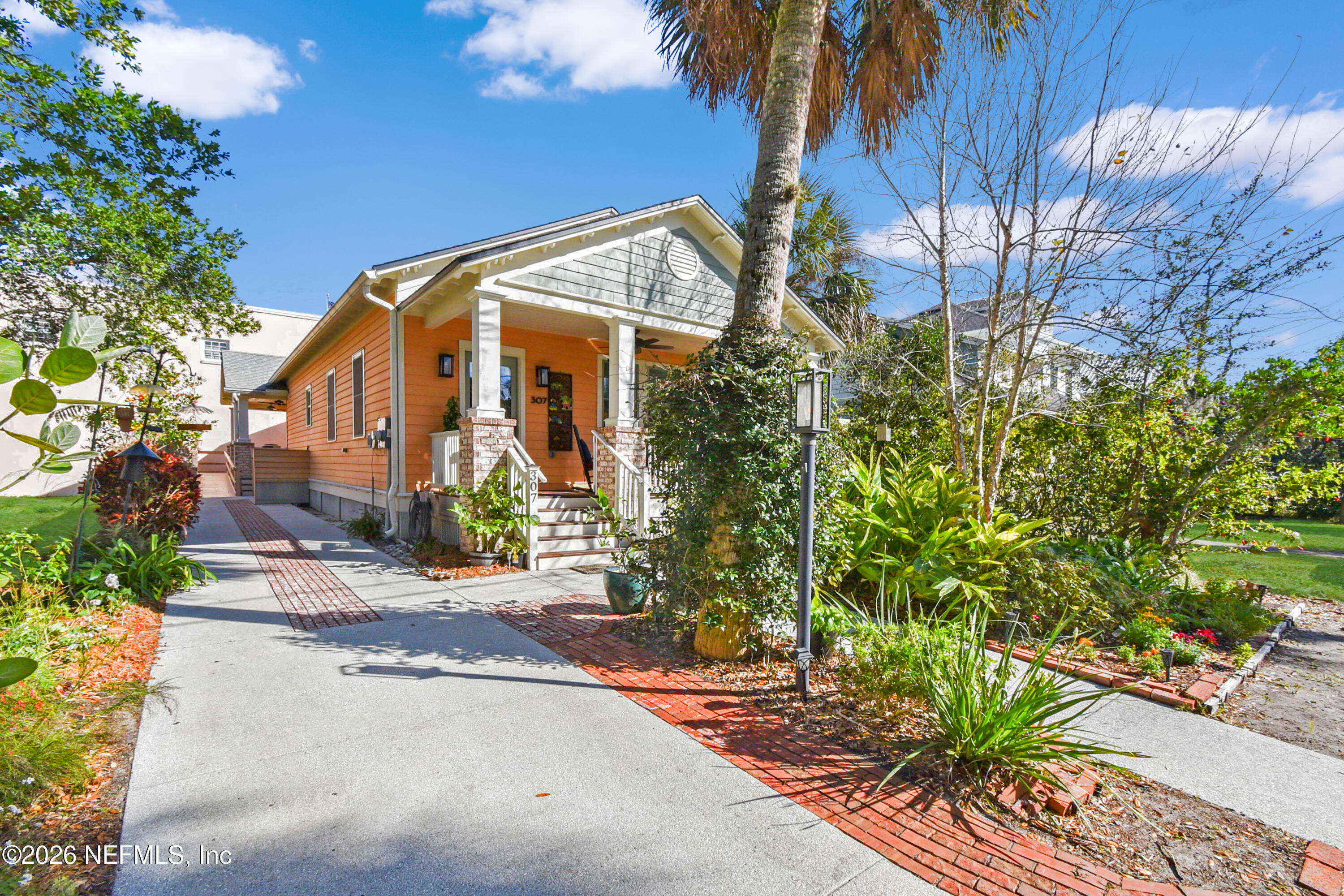 307 St George Street St. Augustine, FL 32084 - Photo 2 of 44 a front view of a house with a yard