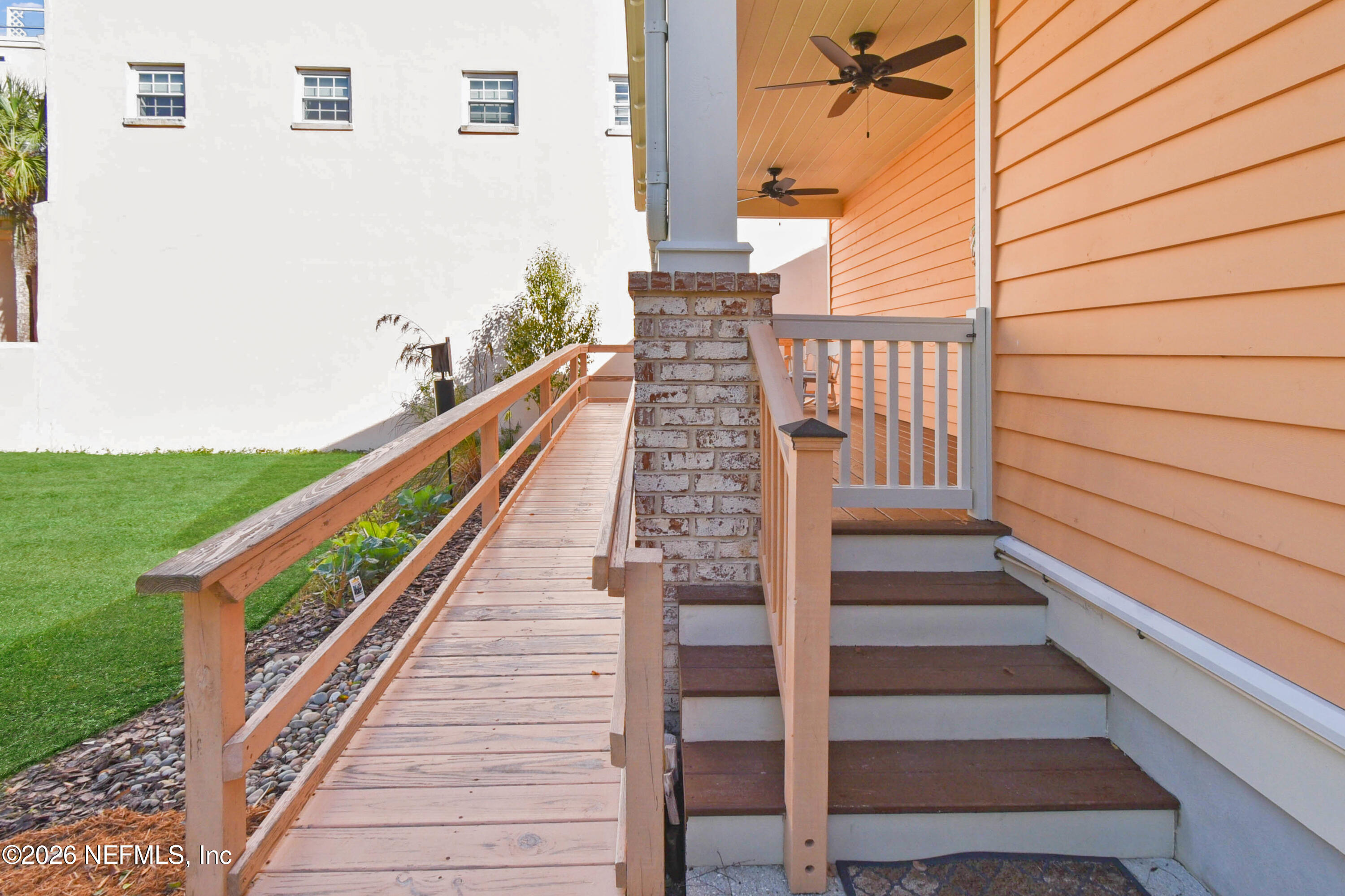 307 St George Street St. Augustine, FL 32084 - Photo 30 of 44 a view of balcony with wooden floor and fence