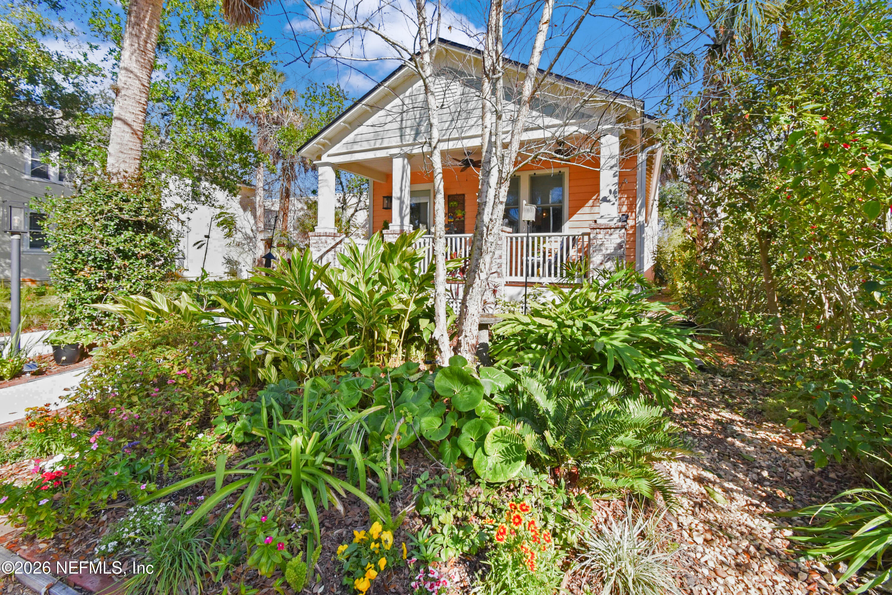 307 St George Street St. Augustine, FL 32084 - Photo 3 of 44 a front view of a house with a garden