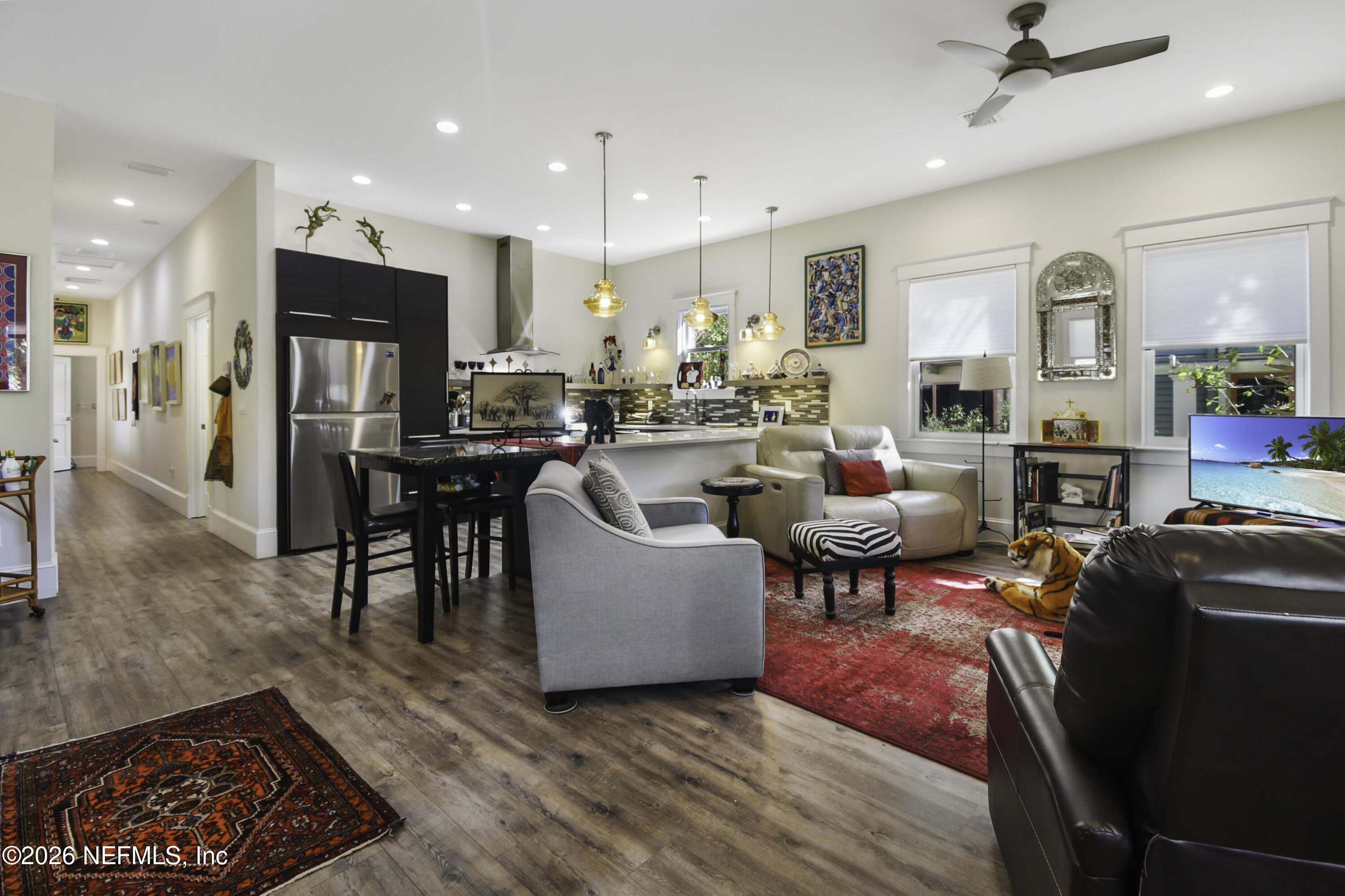 307 St George Street St. Augustine, FL 32084 - Photo 8 of 44 a living room with furniture kitchen view and a wooden floor