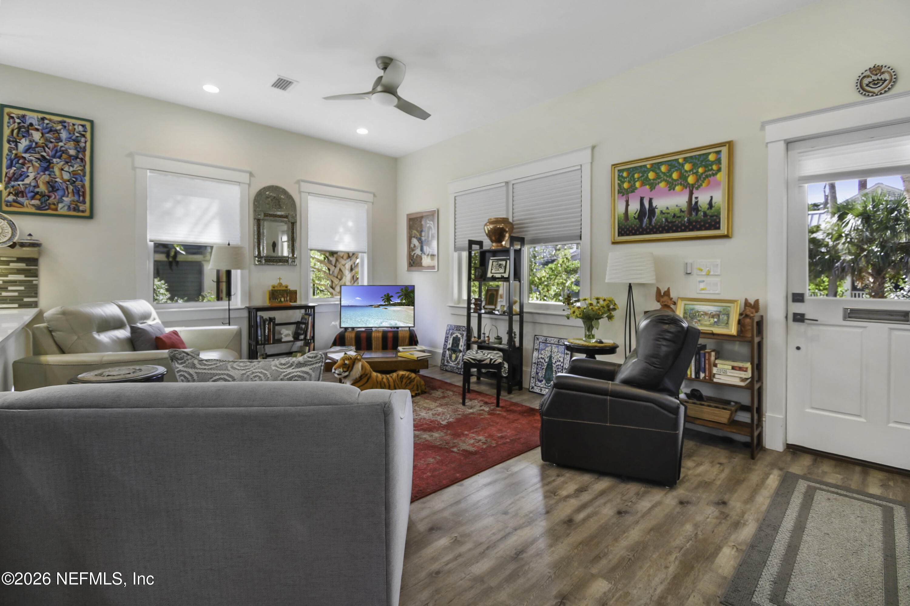 307 St George Street St. Augustine, FL 32084 - Photo 9 of 44 a living room with furniture and a flat screen tv