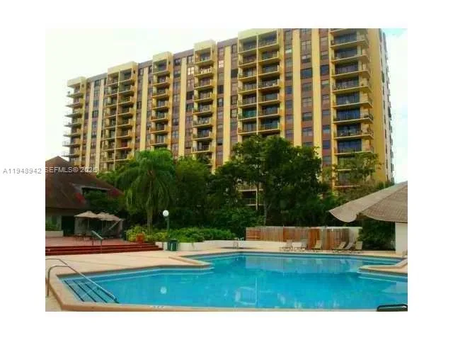 a view of building with yard