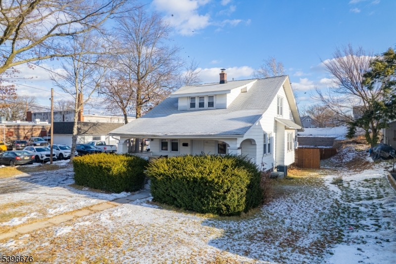 983 Colonial Avenue Union, NJ 07083 - Photo 19 of 28 a front view of a house with garden