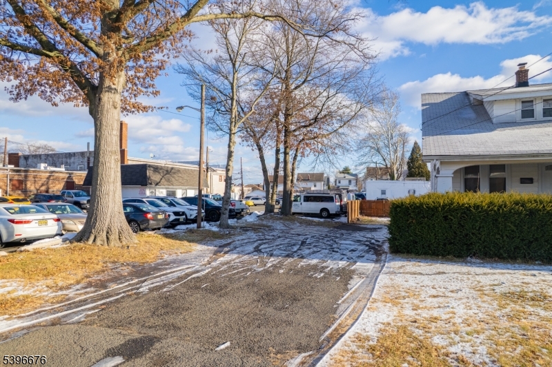983 Colonial Avenue Union, NJ 07083 - Photo 25 of 28 a view of a house with a yard covered in snow
