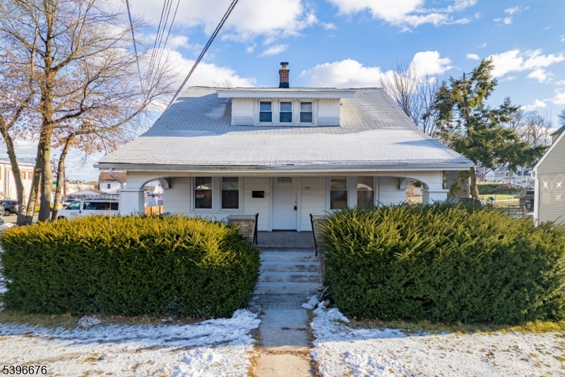983 Colonial Avenue Union, NJ 07083 - Photo 27 of 28 a front view of a house with garden