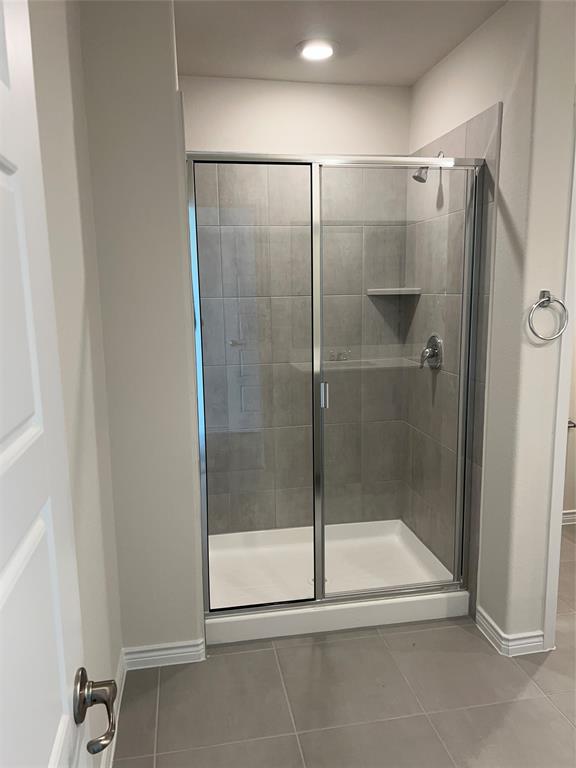 807 Cinnabar Way Princeton, TX 75407 - Photo 17 of 22 a bathroom with a shower