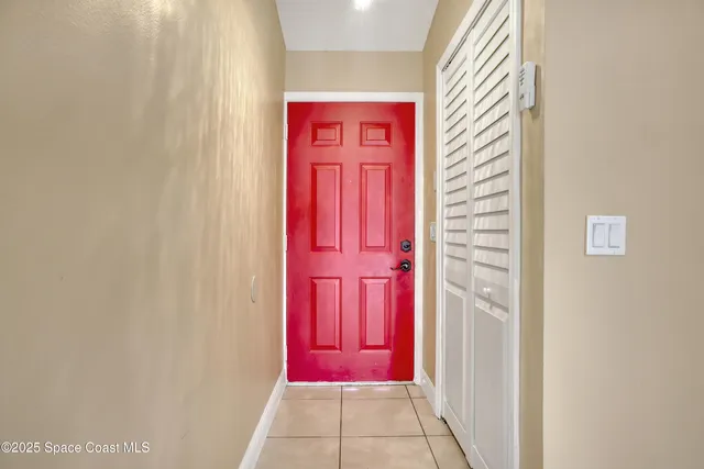 a view of a red door in the house