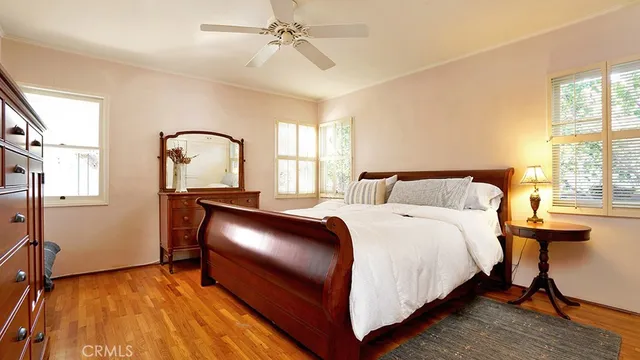 a bed room with a bed and a table