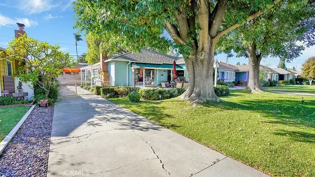 a house with trees in front of it