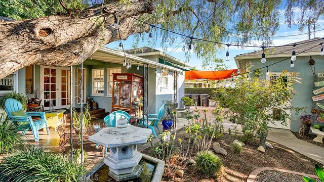 a backyard of a house with seating space