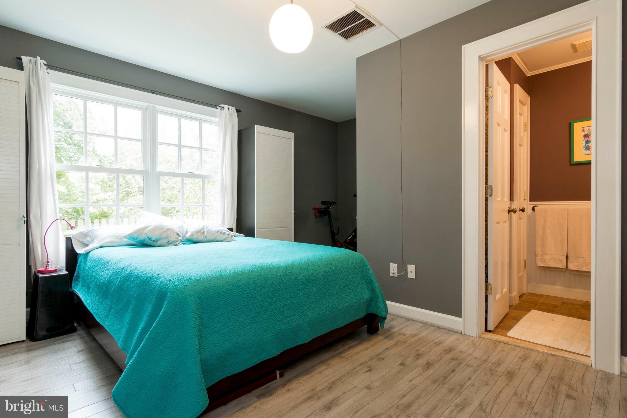 722 Genessee Street Annapolis, MD 21401 - Photo 14 of 29 a bedroom with a bed and a window