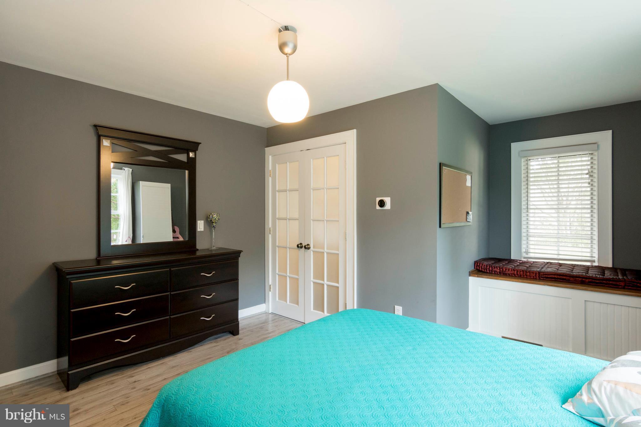 722 Genessee Street Annapolis, MD 21401 - Photo 15 of 29 a bedroom with a bed and a window