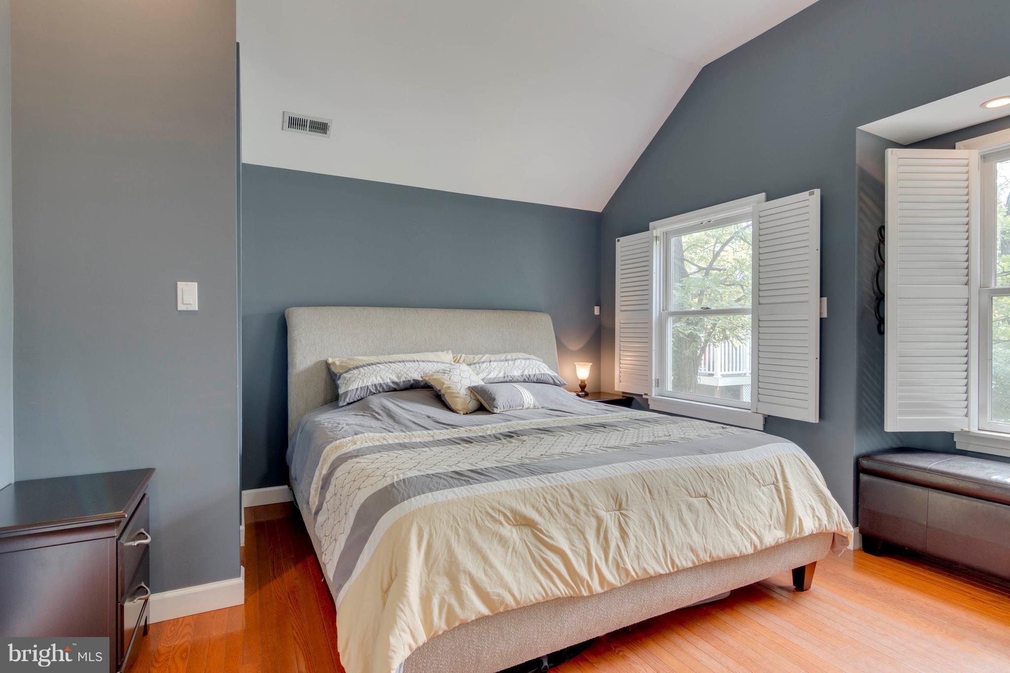 722 Genessee Street Annapolis, MD 21401 - Photo 22 of 29 a large bed sitting in a bedroom next to a window