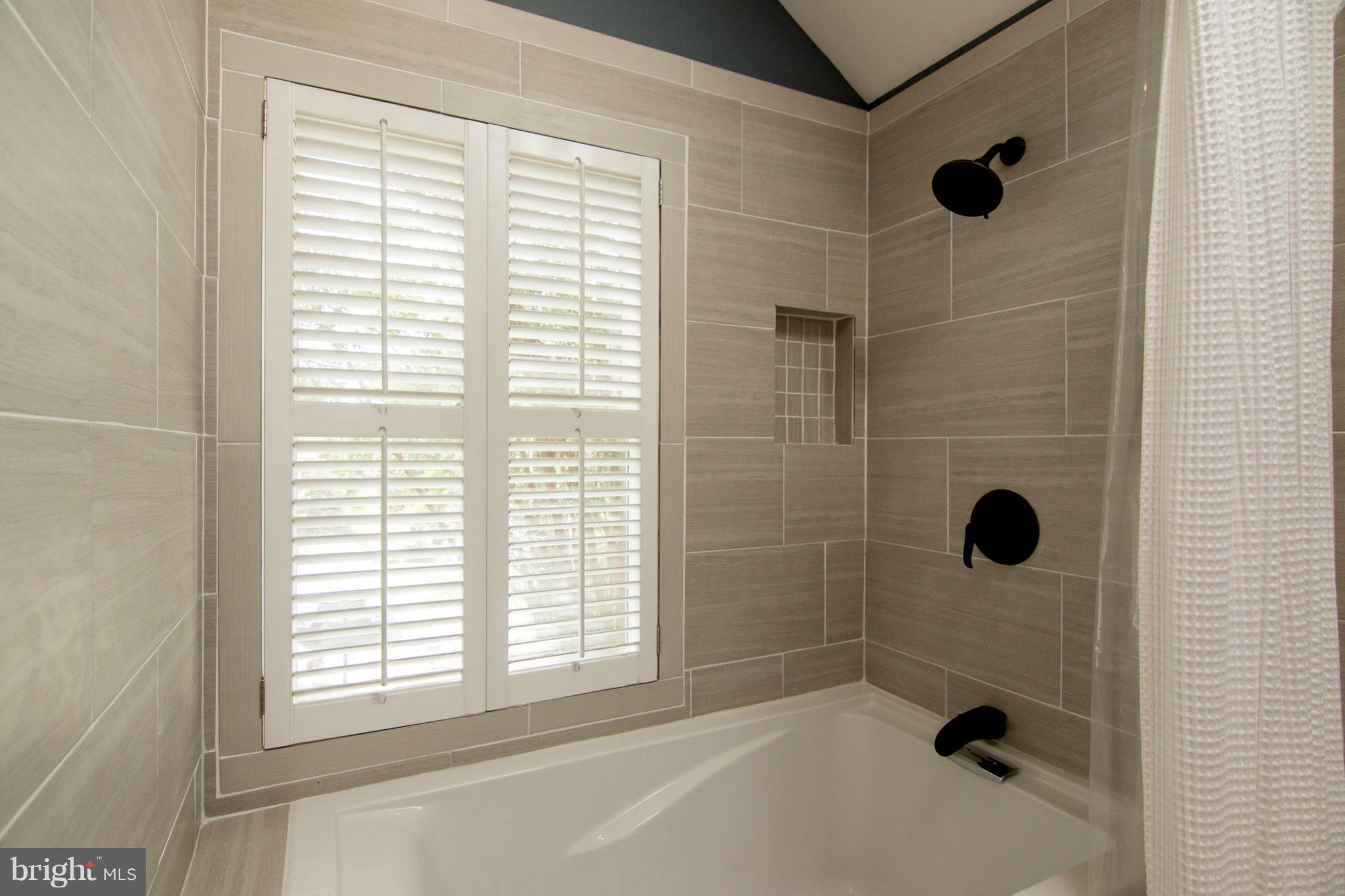 722 Genessee Street Annapolis, MD 21401 - Photo 25 of 29 a bathroom with a shower