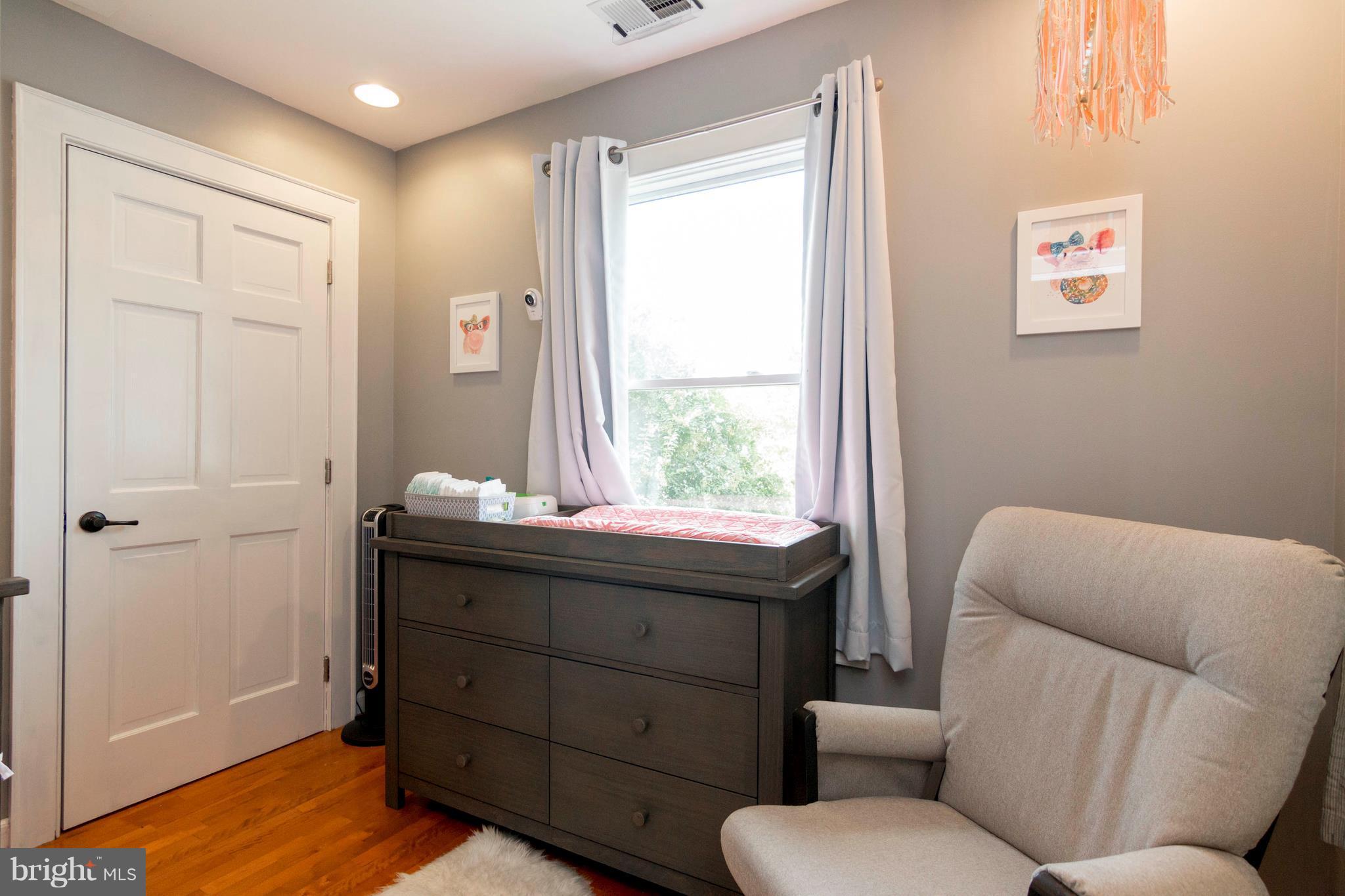 722 Genessee Street Annapolis, MD 21401 - Photo 27 of 29 a bathroom with a toilet sink and mirror