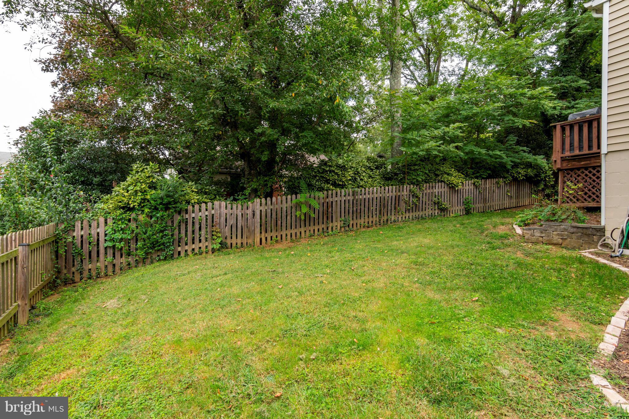 722 Genessee Street Annapolis, MD 21401 - Photo 28 of 29 a view of a yard with a wooden fence