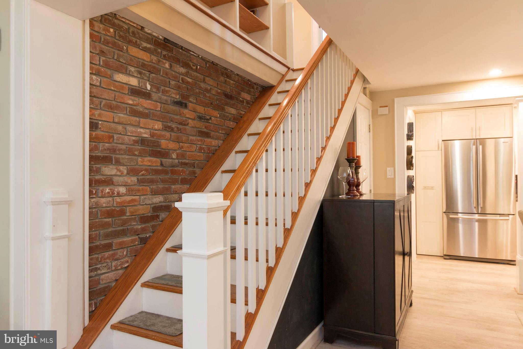 722 Genessee Street Annapolis, MD 21401 - Photo 7 of 29 a view of entryway with wooden floor and stairs