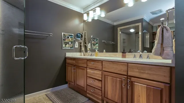 a bedroom with furniture and a wooden floor