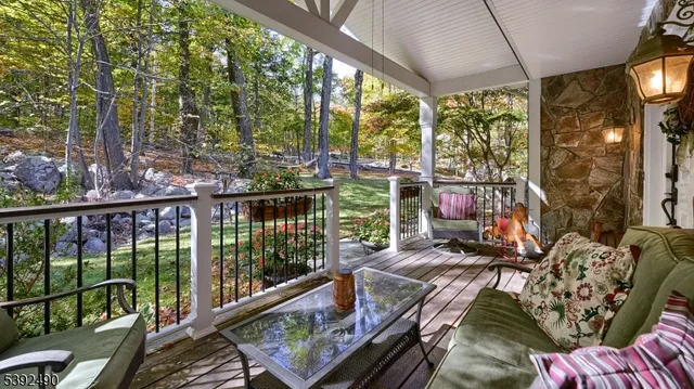 a view of balcony with furniture