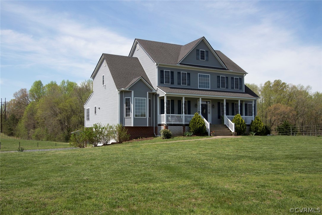 6085 Cartersville Road Powhatan, VA 23139 - Photo 13 of 50 Full front porch, back deck and a patio! Vinyl si