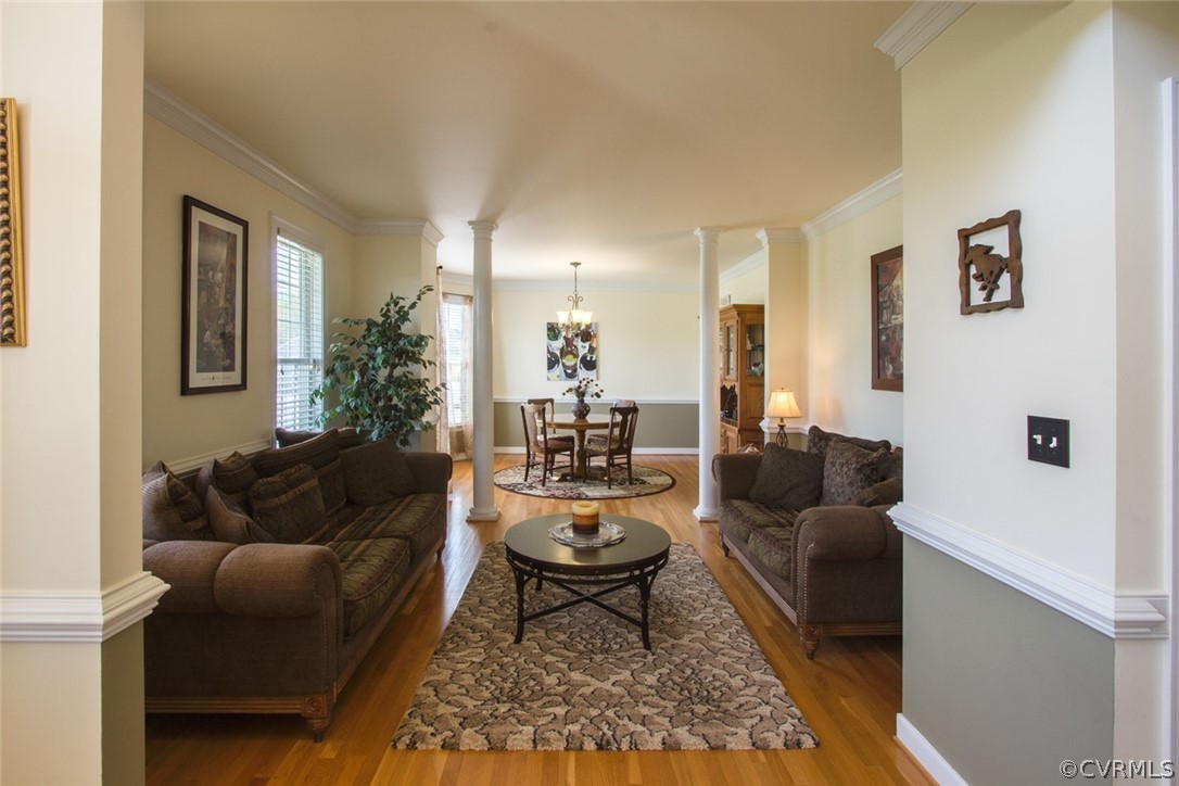 6085 Cartersville Road Powhatan, VA 23139 - Photo 16 of 50 Formal living and dining room with columns, moldin