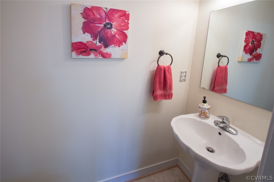 6085 Cartersville Road Powhatan, VA 23139 - Photo 22 of 50 Powder room off the kitchen.