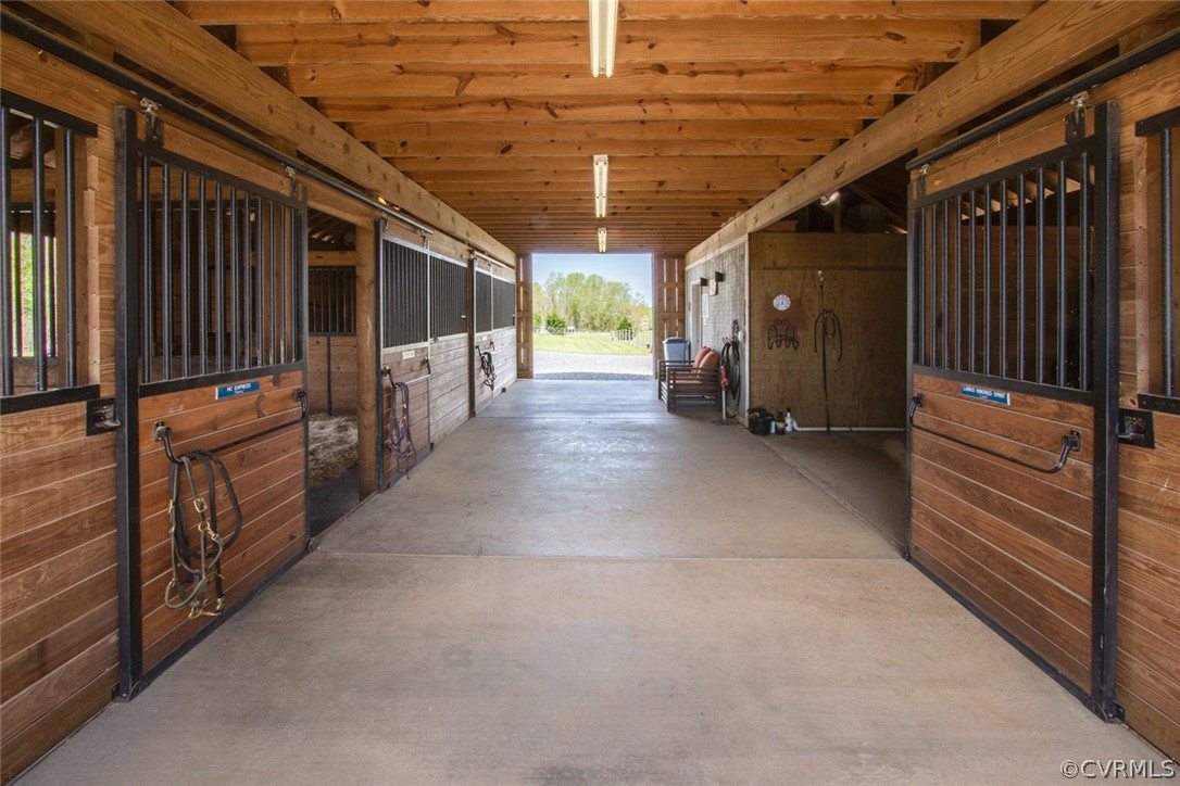 6085 Cartersville Road Powhatan, VA 23139 - Photo 3 of 50 4 stall center aisle with tack room, wash stall an