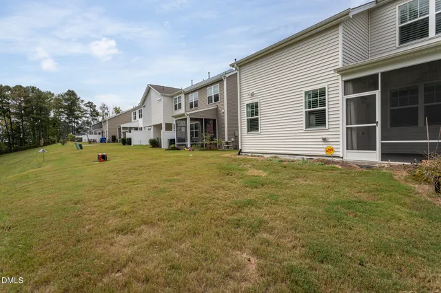 a view of a yard in front of a house