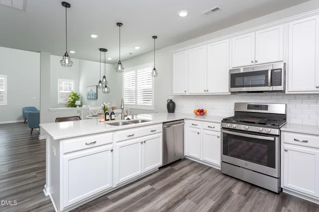 a view of a balcony with yard