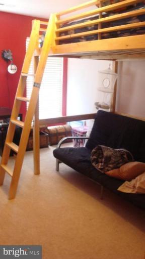 17567 Deweys Run Lane Dumfries, VA 22026 - Photo 11 of 20 a living room with furniture and a window